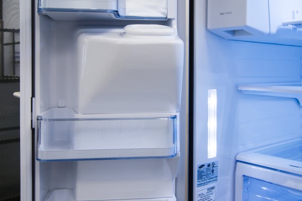 Left-door storage is kept pretty minimal to accommodate the Samsung RF28HDEDBSR's bulky ice dispenser.