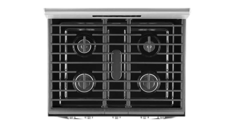 A top-down look at the Whirlpool gas range's five burners, which is covered by three cast-iron grates.