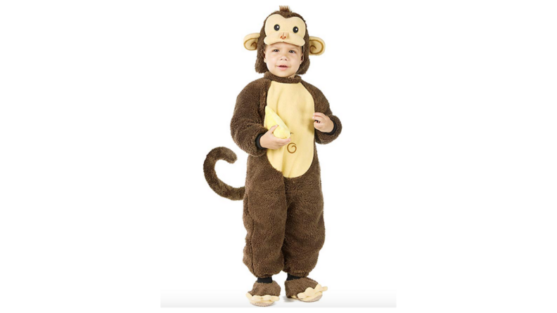 A baby wearing a monkey costume.