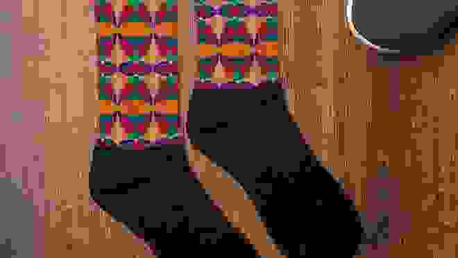 Socks with black feet and primary-color-printed ankles.