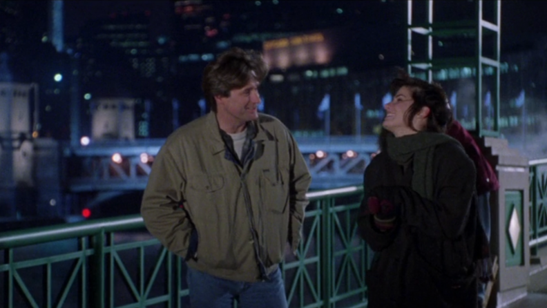 A still from 'While You Were Sleeping' featuring Bill Pullman and Sandra Bullock.