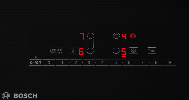 Cooktop controls in use
