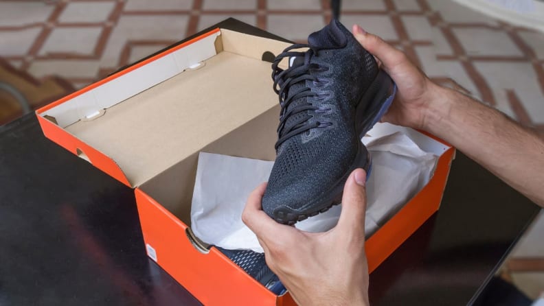 running shoes being taken out of the box