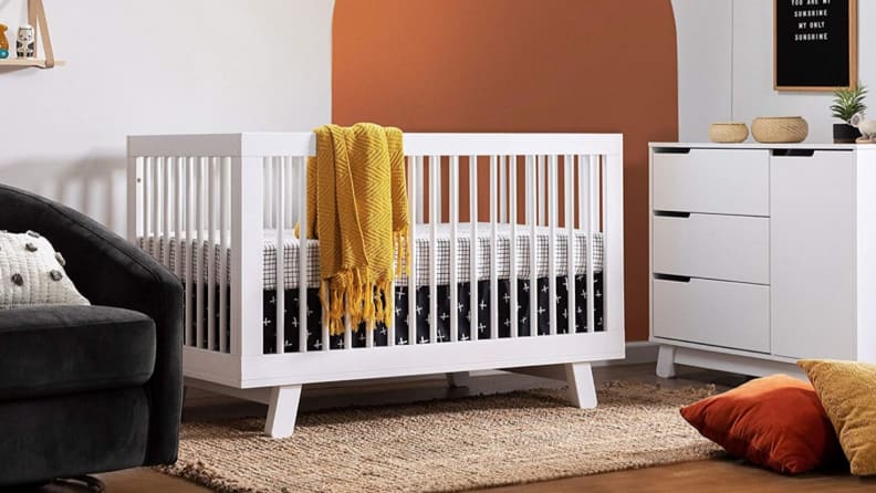 Stylish, mid-century modern crib in a hipster baby nursery.