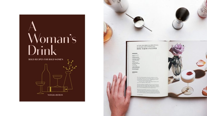 Left: A dark purple-hued cookbook titled A Woman's Drink. Right: The cookbook lays open on a white countertop surrounded by various bar tools and cocktail ingredients, with a hand pressing gently to keep the cookbook open.