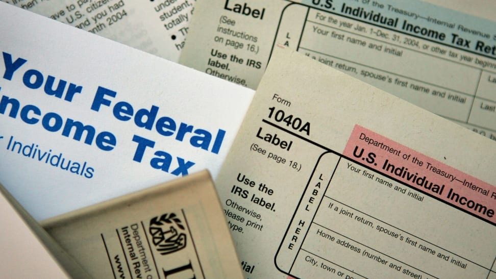 A closeup of a pile of tax forms from the IRS