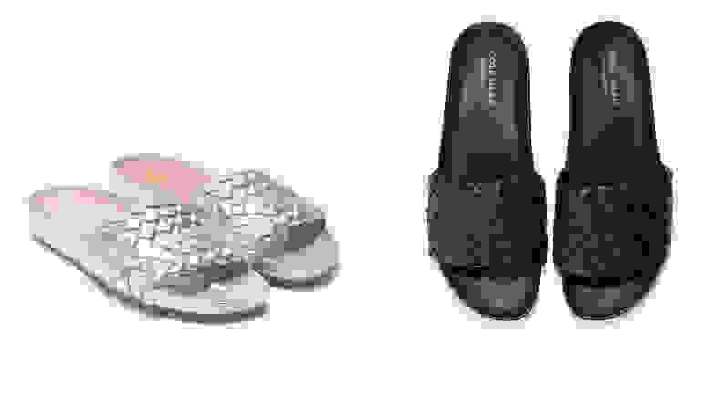 Silver and black slide sandals on grey background