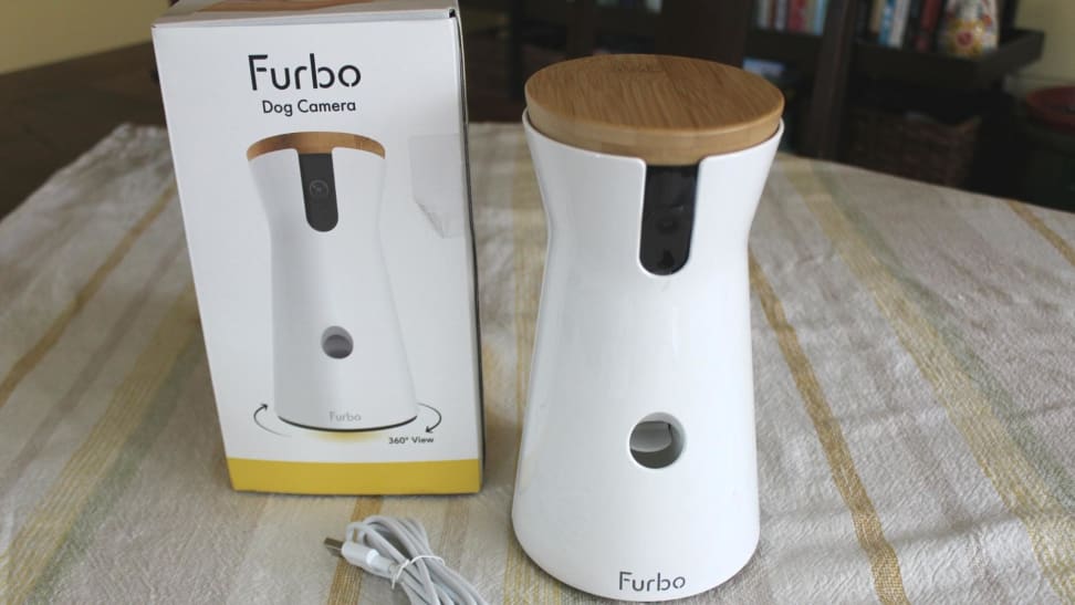 The Furbo Dog Cam sitting right next to the its retail box.