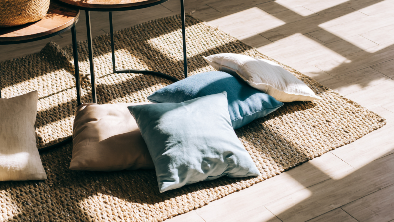 A wool rug in a living room.