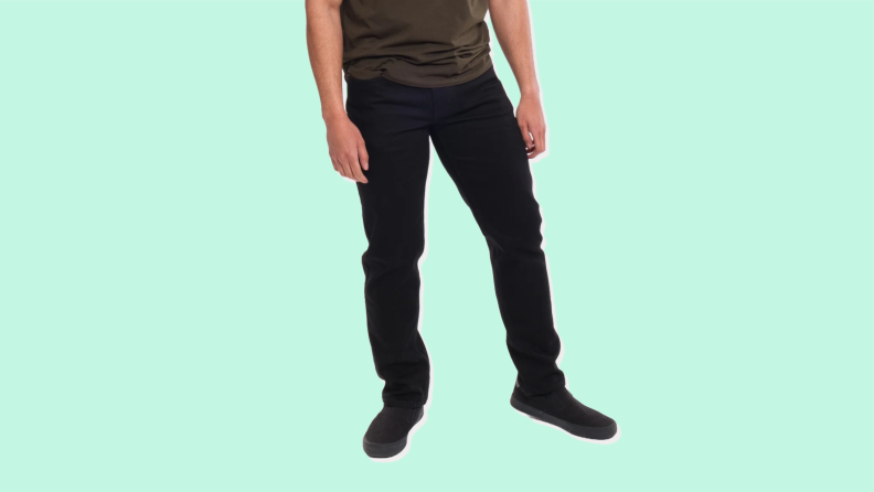 A pair of Premium Denims by Perfect Jeans on a green background
