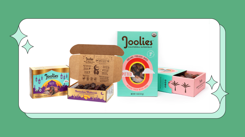 Boxes of Joolies dates on a white background