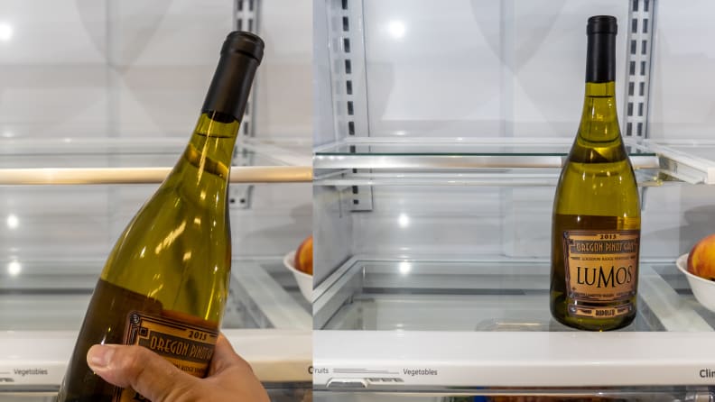 A wine bottle is too short for a shelf and then it stands on a shelf