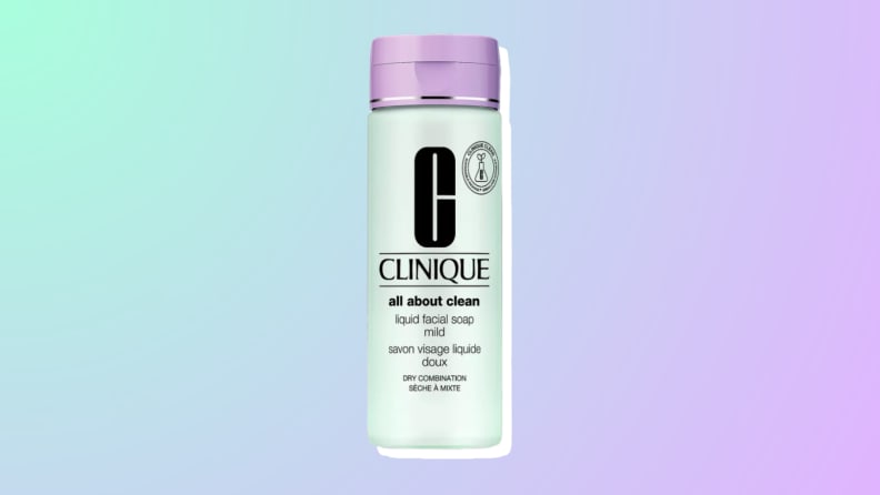Clinique All About Clean Liquid Facial Soap face wash against a blue, green, and purple background.