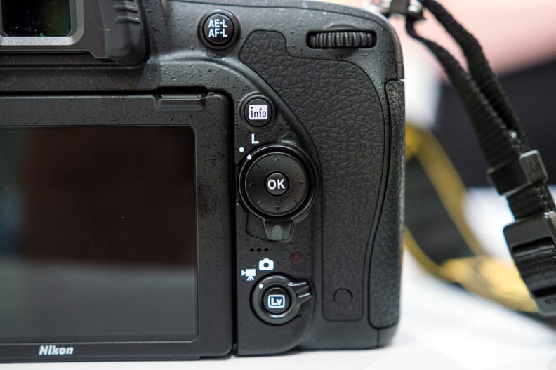 Live mode, directional pad, and other important controls are to the right of the LCD.