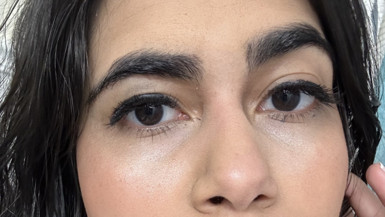 Close-up of a woman's eyelashes wearing Glamnetic products.