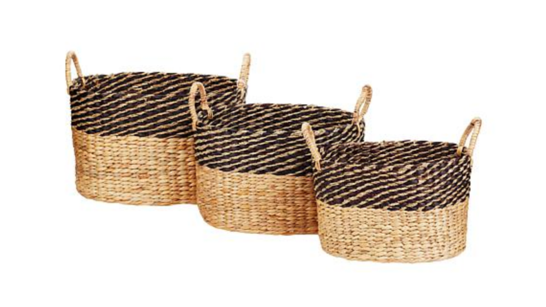 An image of three different baskets in pale hyacinth material and black.