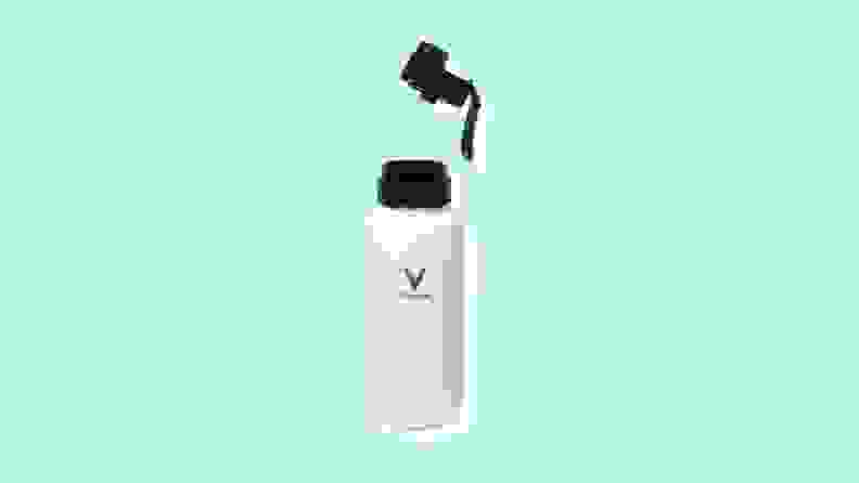 White insulated Vitapod reusable water bottle with cap unscrewed.