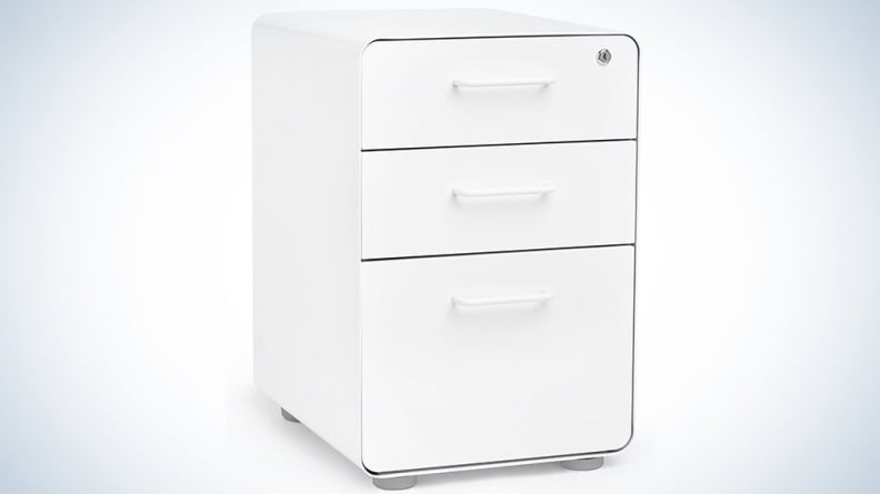 white filing cabinet on faded blue background.