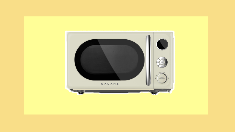 Cream colored Galanz Retro Countertop Microwave Oven.