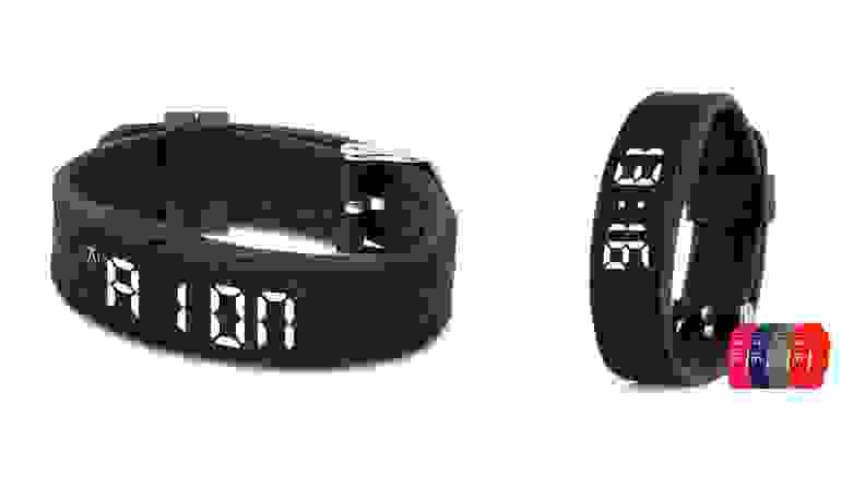 A black tabtime band on a white background. The band fits around the wrist and has a small clock display.