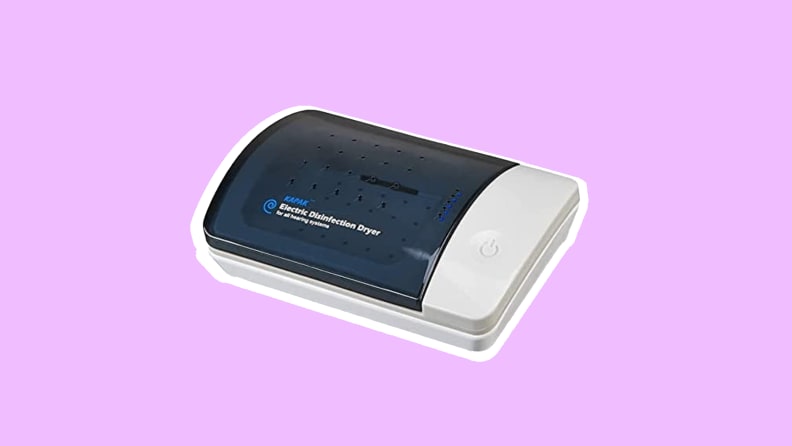 Audioactive Ultra Violet C clean hearing aid dryer with clear blue cover.