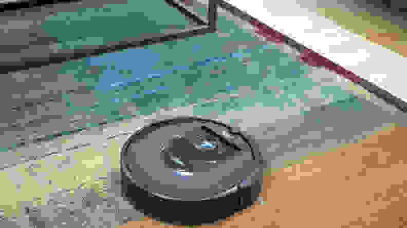 The iRobot Roomba i7+ cleaning a carpet