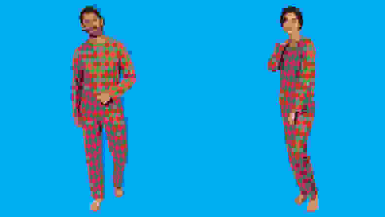 A man and a woman wearing the Leveret Two-Piece Cotton Argyle Christmas Pajamas on a blue background.