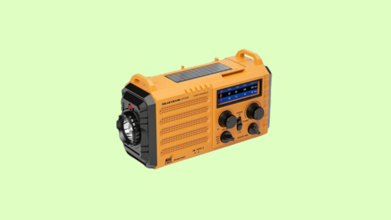 A yellow radio against a green background