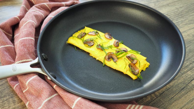 A mushroom omelet is displayed in the OXO GoodGrips nonstick pan.