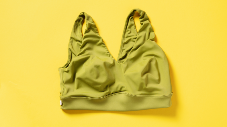 green bra on yellow background