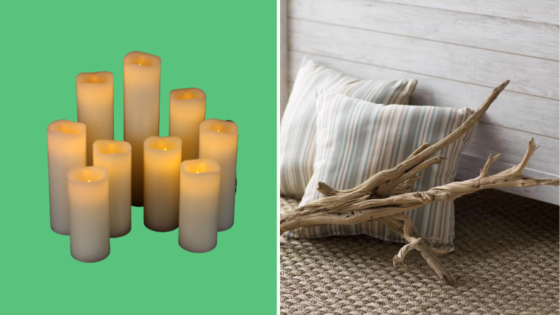 A set of candles and a piece of drift wood against a set of pillows.