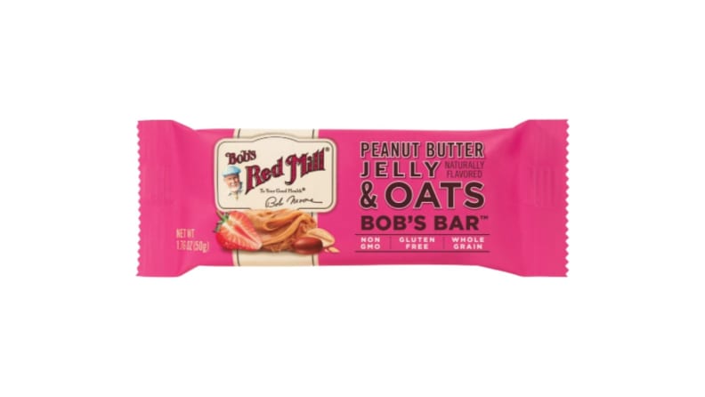 A peanut butter and jelly-flavored granola bar wrapped in a bright pink wrapper.