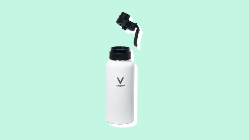 White insulated Vitapod reusable water bottle with cap unscrewed.
