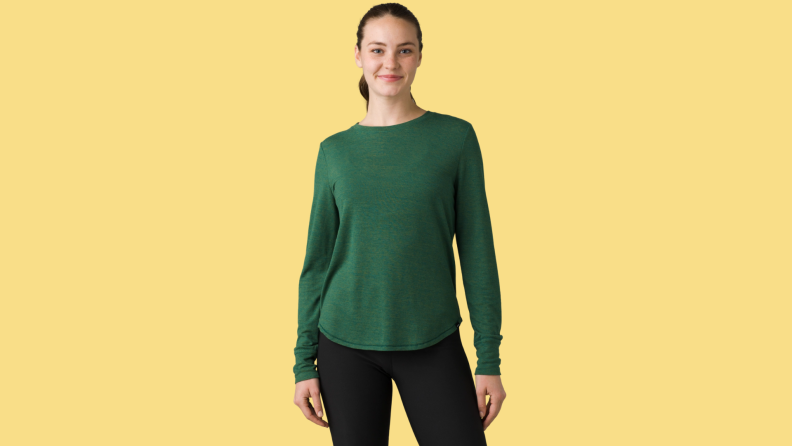 A model showing a green Prana shirt.