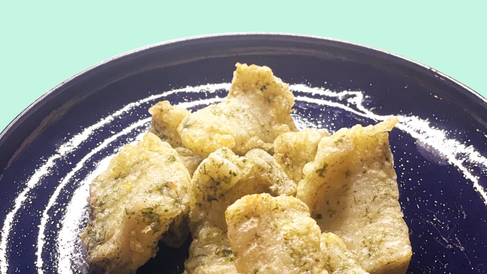 Fried fish on a blue plate