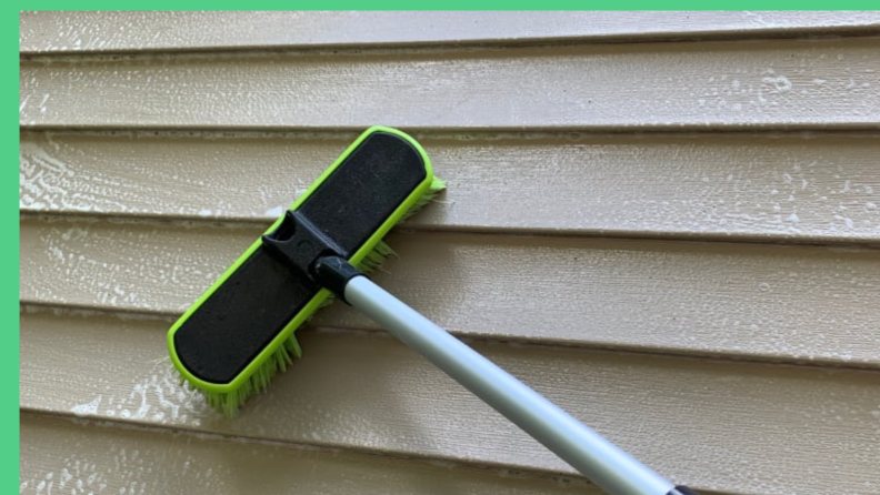 Using a garden hose, a cleaner, and a soft bristled brush is a gentle but effective way to remove grunge from your vinyl siding.