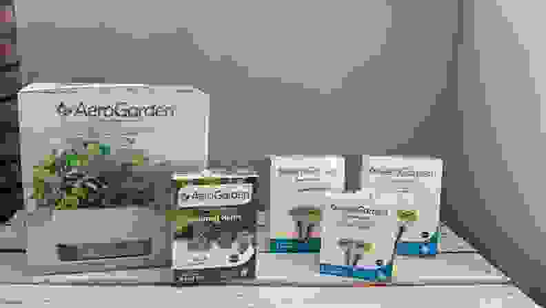 AeroGarden Harvest Elite and a variety of seed pods in packaging
