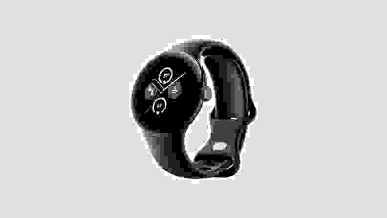 A black Google Pixel Watch 2 smartwatch with a watch displaying on its round screen.