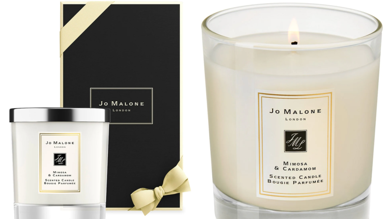 On left, cream colored Jo Malone Mimosa and Cardamom Home Candle next to black packaging box. On right, Jo Malone Mimosa and Cardamom Home Candle.