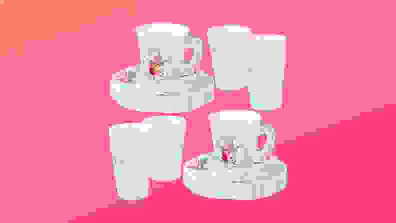 A set of tea cups in front of a background.