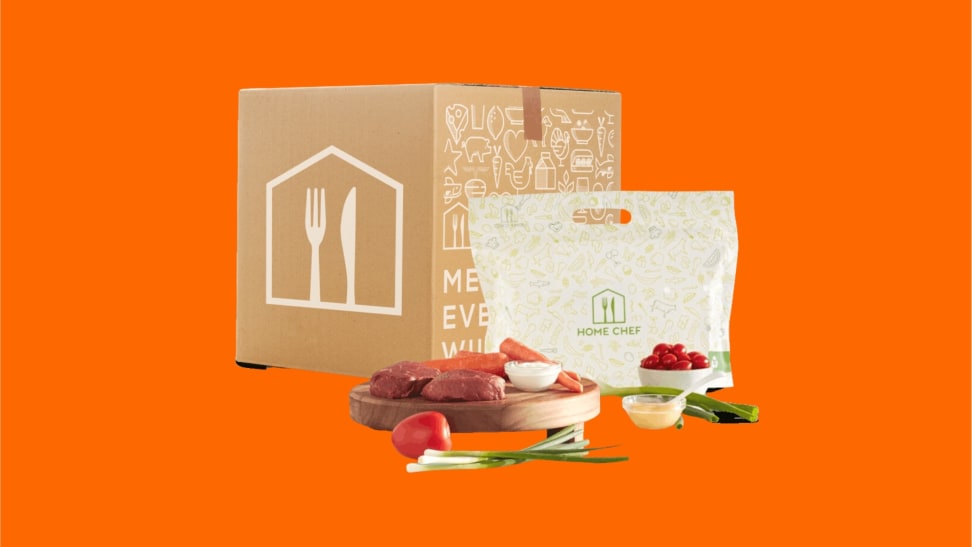A Home Chef delivery box with ingredients on display.