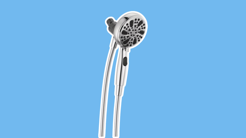 The Delta Faucet 6-Spray SureDock Magnetic Shower Head in silver on a blue background.