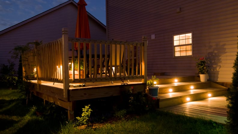 Patio deck outdoors lit up at night