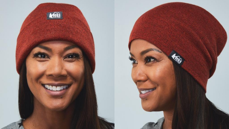 Woman wearing a red REI beanie