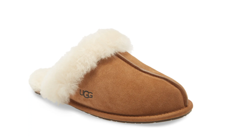 One chestnut brown fur-lined slipper.