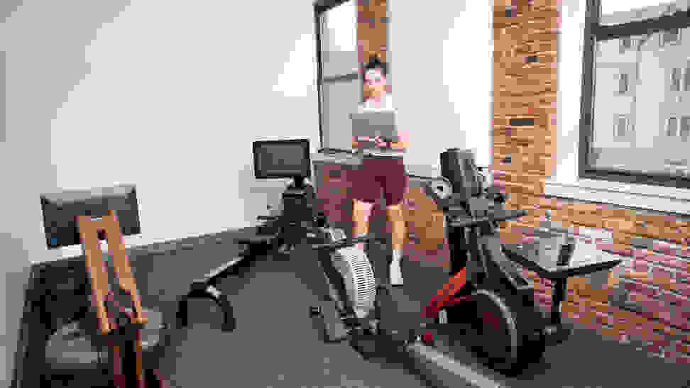 A woman testing rowing machines