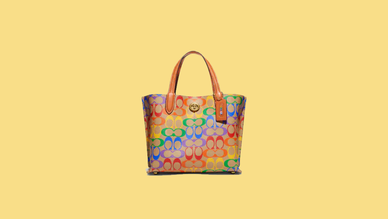 rainbow printed purse on yellow background