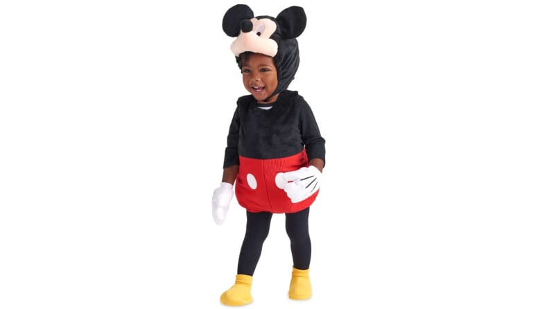 A baby in a Mickey Mouse costume.