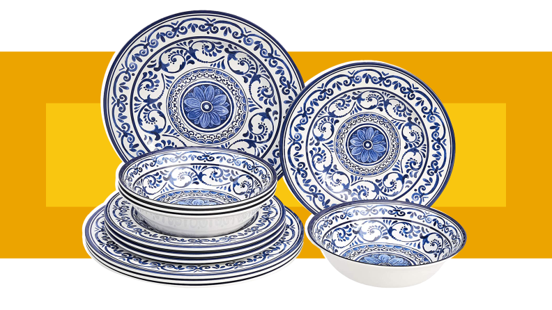 The Amazon Basics Melamine Dinnerware Set in front of a background.
