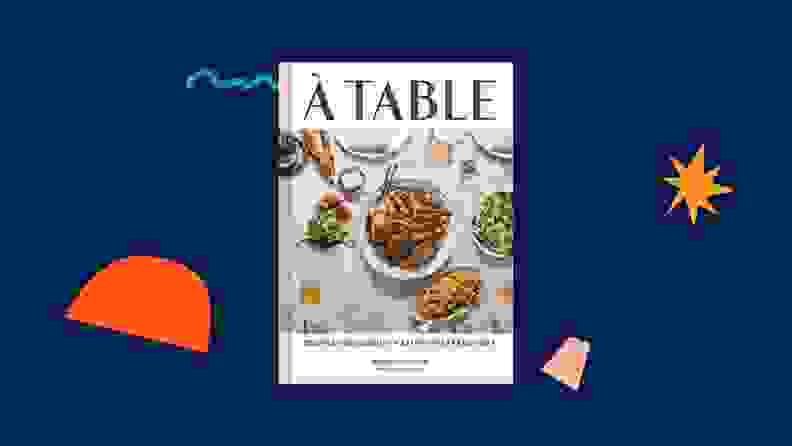 À Table cookbook against a dark blue background.